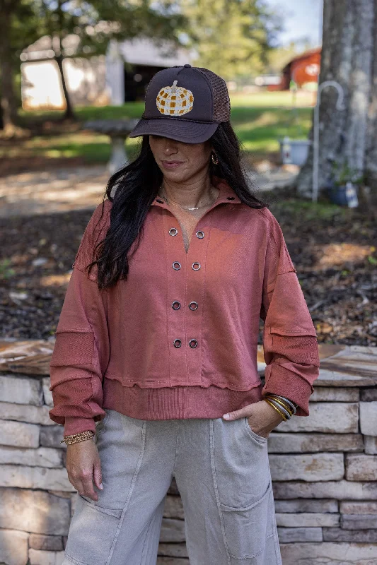 Eyelet Adorned Rust Knit Pullover Surplice Neck Pullover